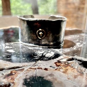 Unique silver bracelet with cross accent